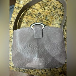 Louis Vuitton Reverie Purse in good condition! Blemishes as shown. Lilac color